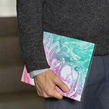 A business man holds Personalized VistaCase reMarkable Pen Holder Case with Abstract Oil Painting design