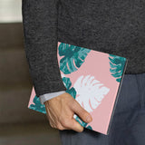 A business man holds Personalized VistaCase reMarkable Pen Holder Case with Pink Flower 2 design