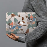 hardshell case with Artistic Flower design combines a sleek hardshell design with vibrant colors for stylish protection against scratches, dents, and bumps for your Macbook